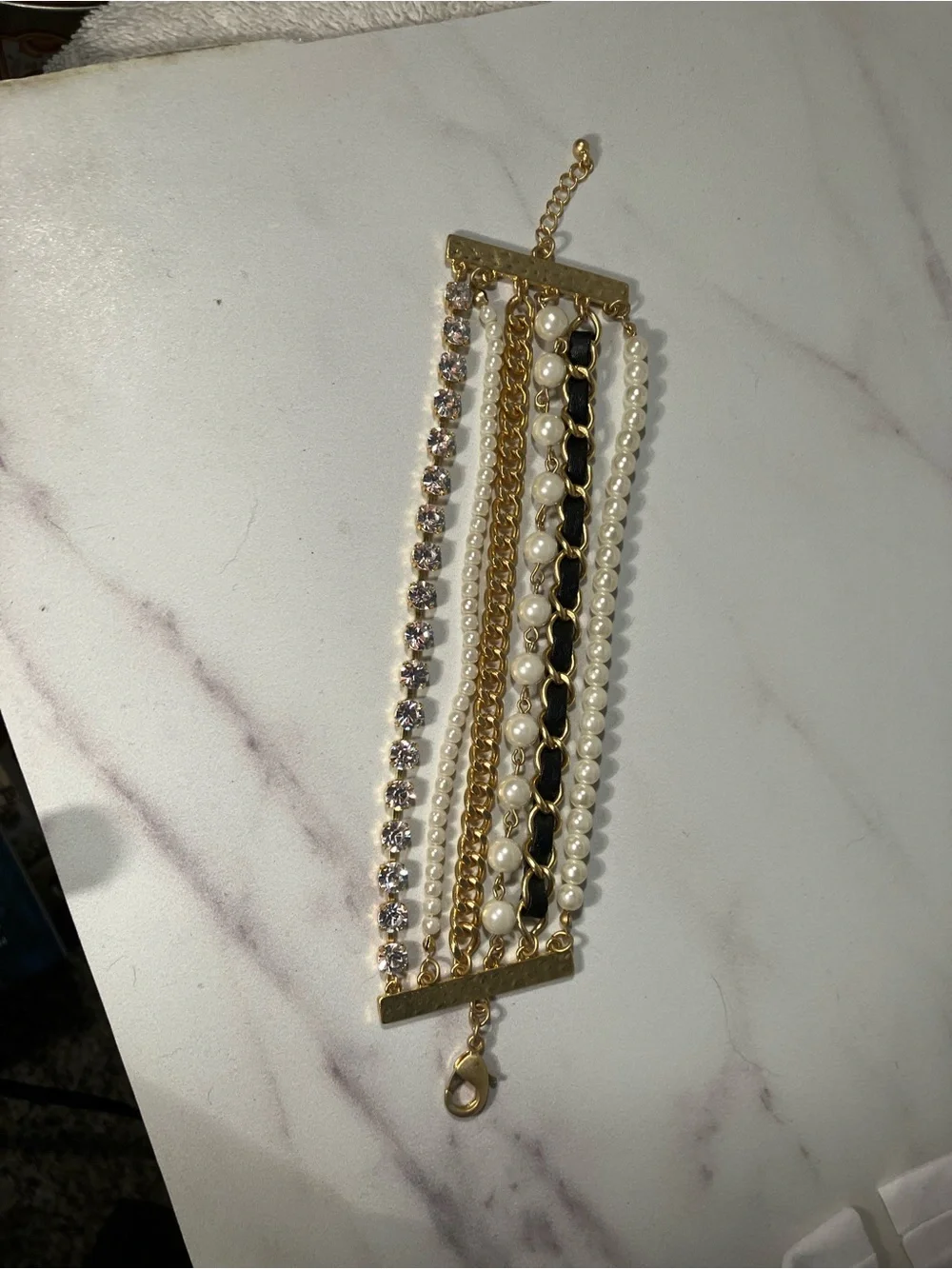 Pearls, goldtone and crystal ‘Fashion Scene’ 6 strand bracelet